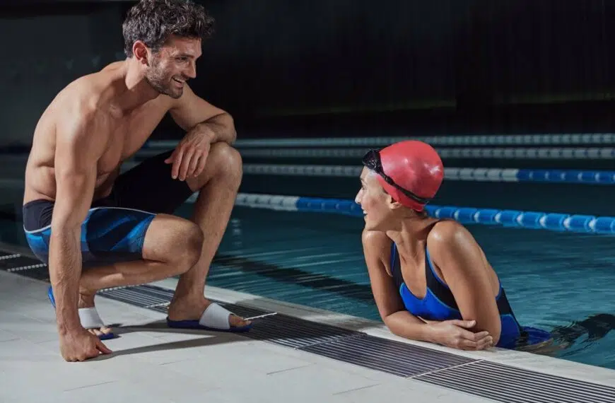 man and woman talk at swimming pool