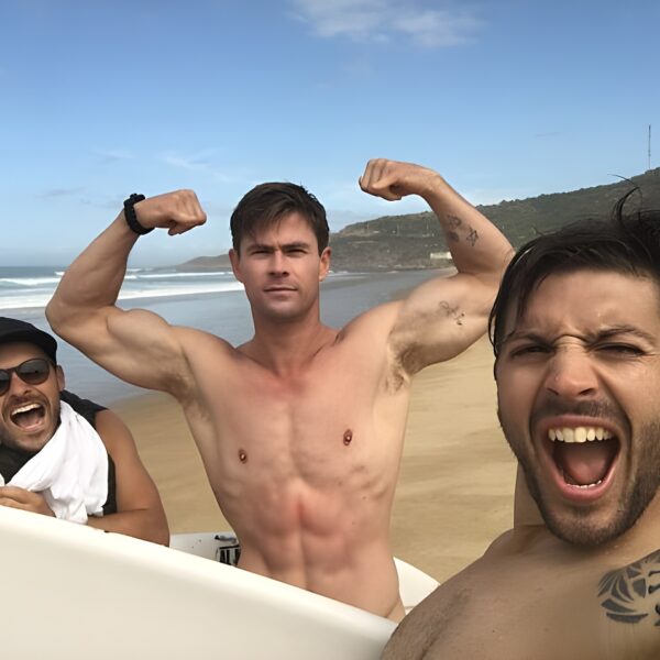 Chris Hemsworth with friends on beach