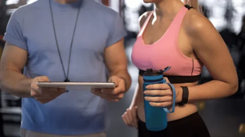 fitness trainer with client