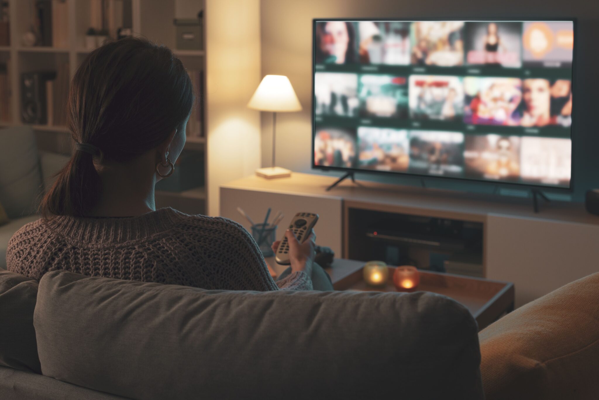 Person watching Television from Couch