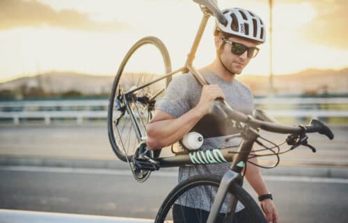 Cyclist holds Canyon Bike