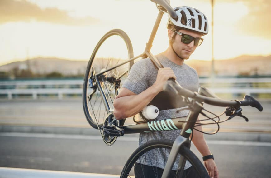 Cyclist holds Canyon Bike