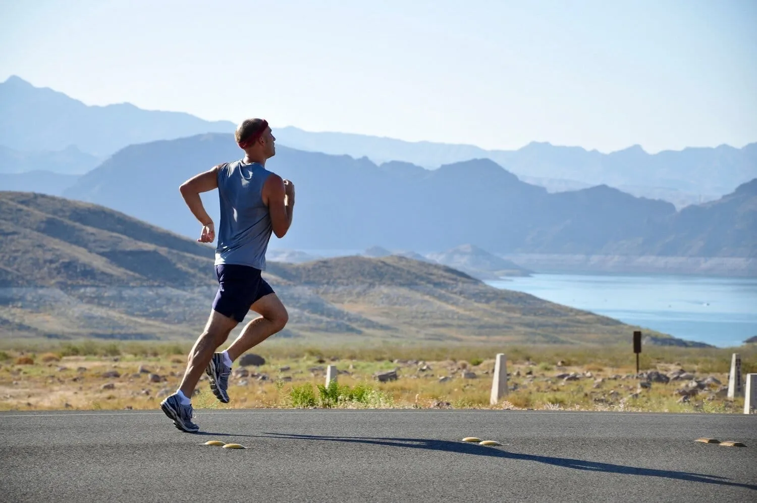 runner with mountains in background