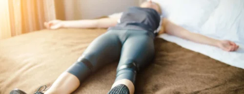 Woman having a rest after run and hard workout