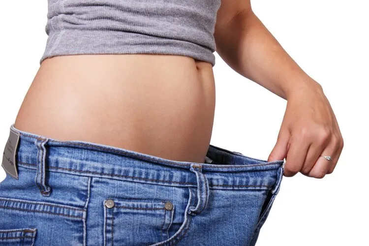 Person in loose fitting jeans