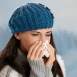 woman in cold wearing hat