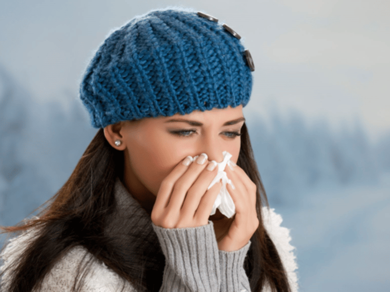 woman in cold wearing hat