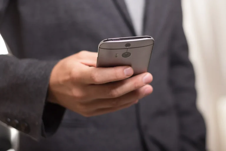 man with phone in hand