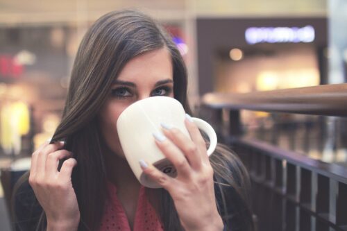 woman with cup of coffee