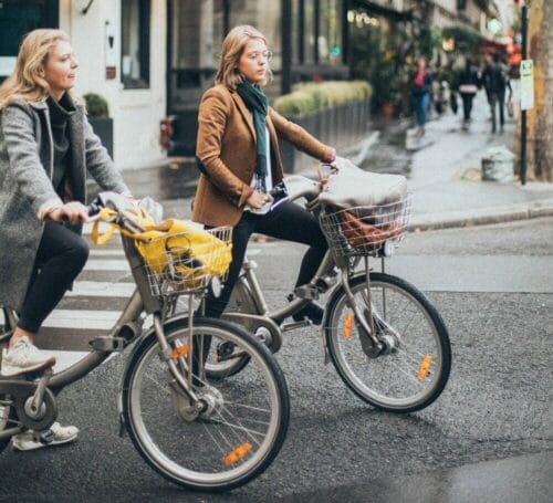 1 women riding bikes 1850629 e1638215315436