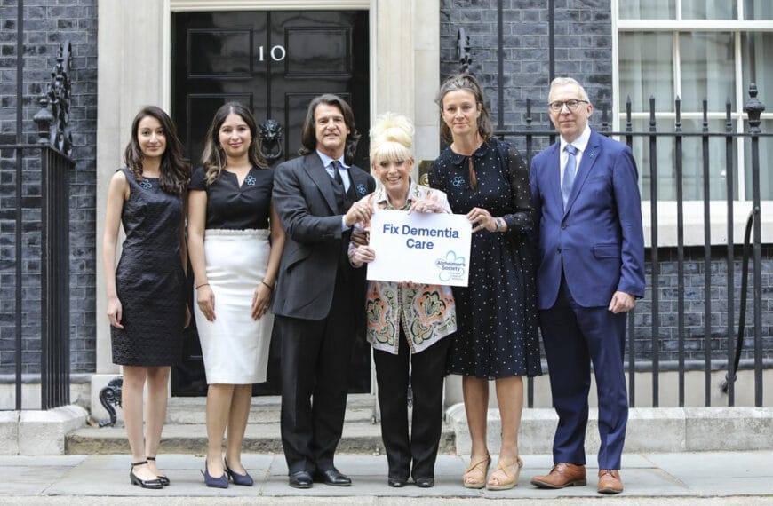 Dame Barbara Windsor and Scott Mitchell stand with Alzheimer’s Society at No.10 to demand dementia care reform