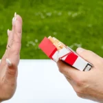 hand rejecting the offer of a cigarette