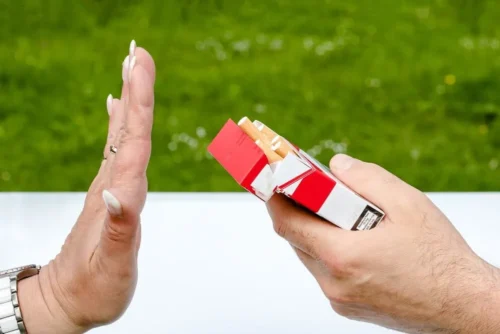 hand rejecting the offer of a cigarette