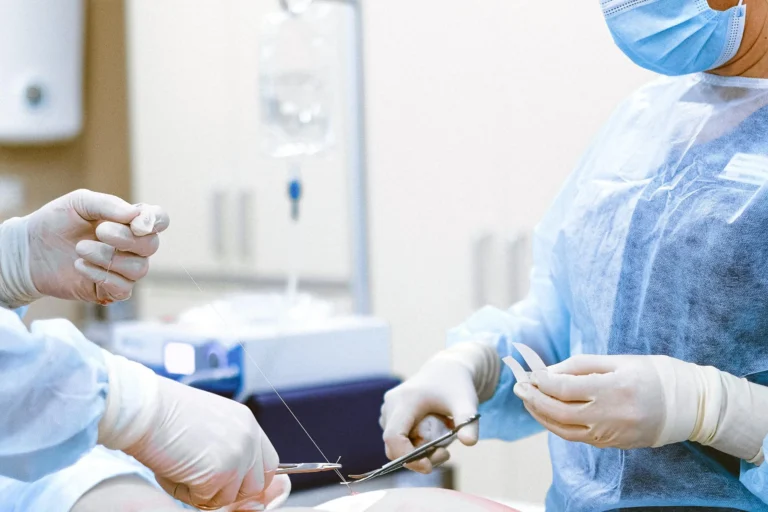 photo of medical professionals wearing personal protective scaled