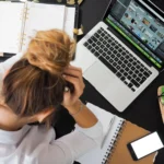 stressed person at desk