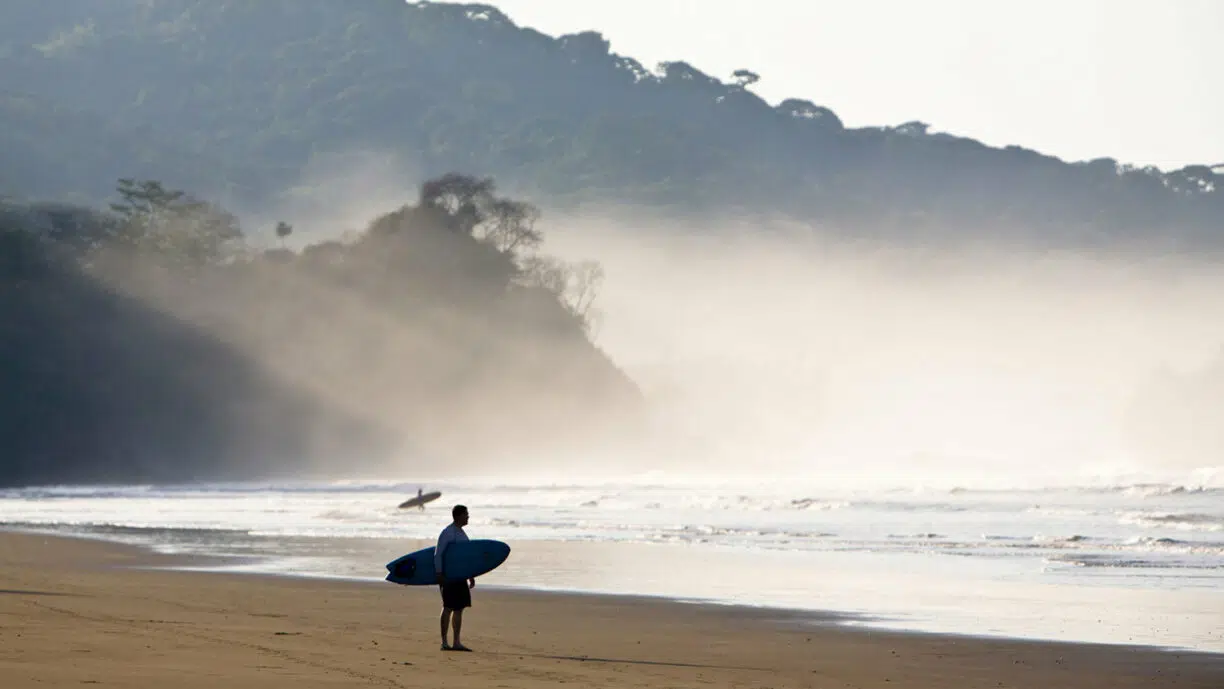 Surfer on beach