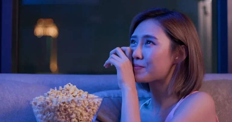 womancryingatfilmwithpopcorn