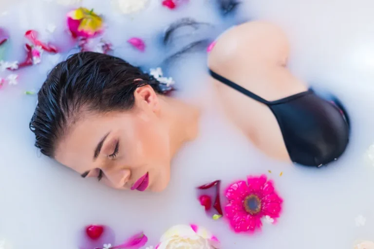 woman in bath filled with flowers