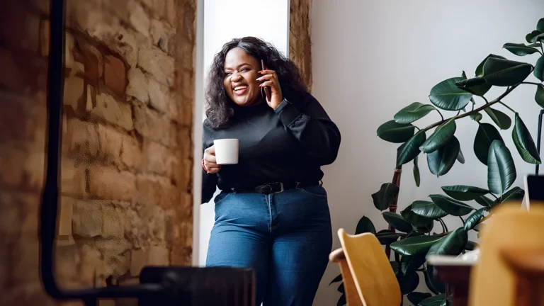 Woman on phone laughing