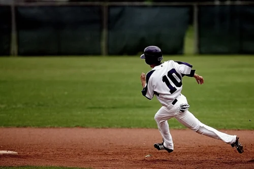 baseball player running to base