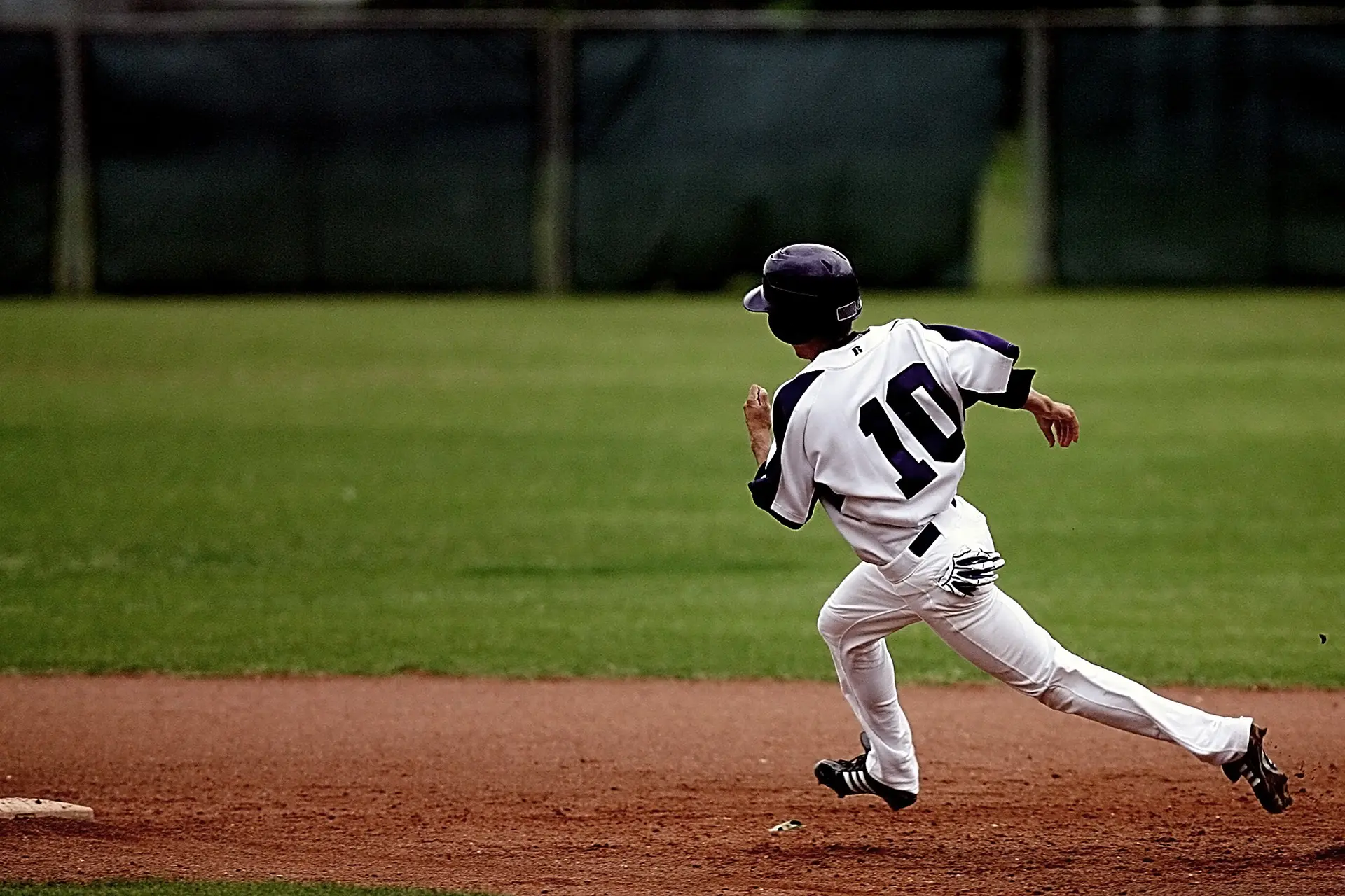 Baseball player running to base
