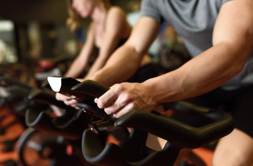 couple on exercise bikes scaled