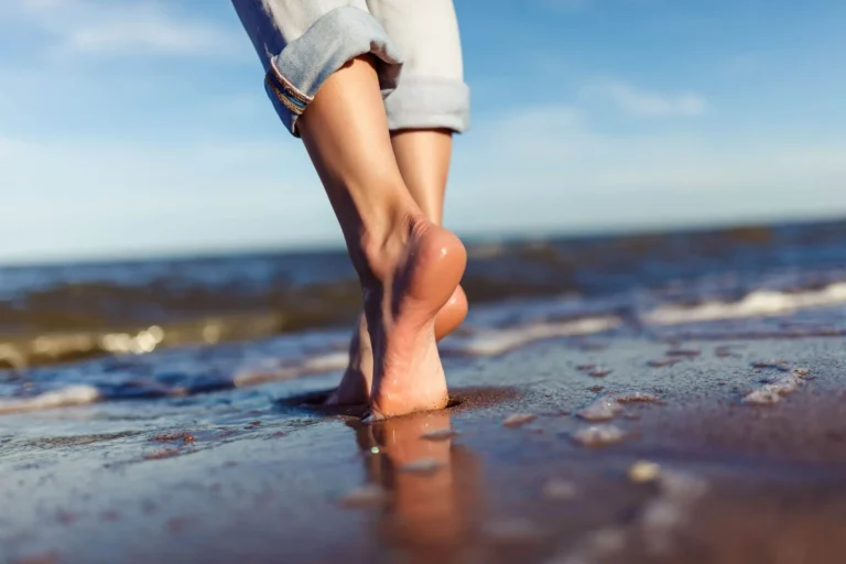 feet wallking in the sea scaled