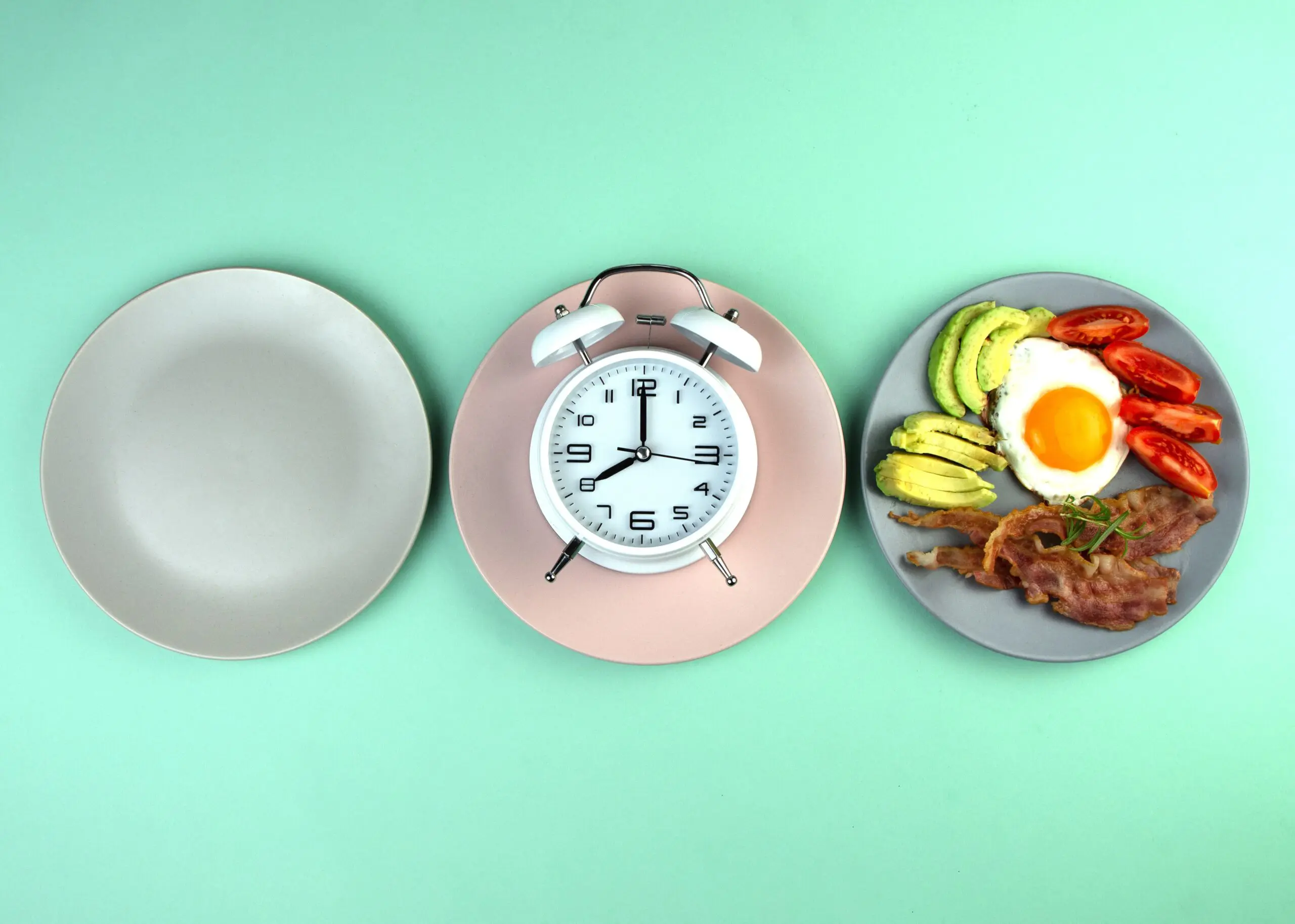 Plates of food with clock on scaled