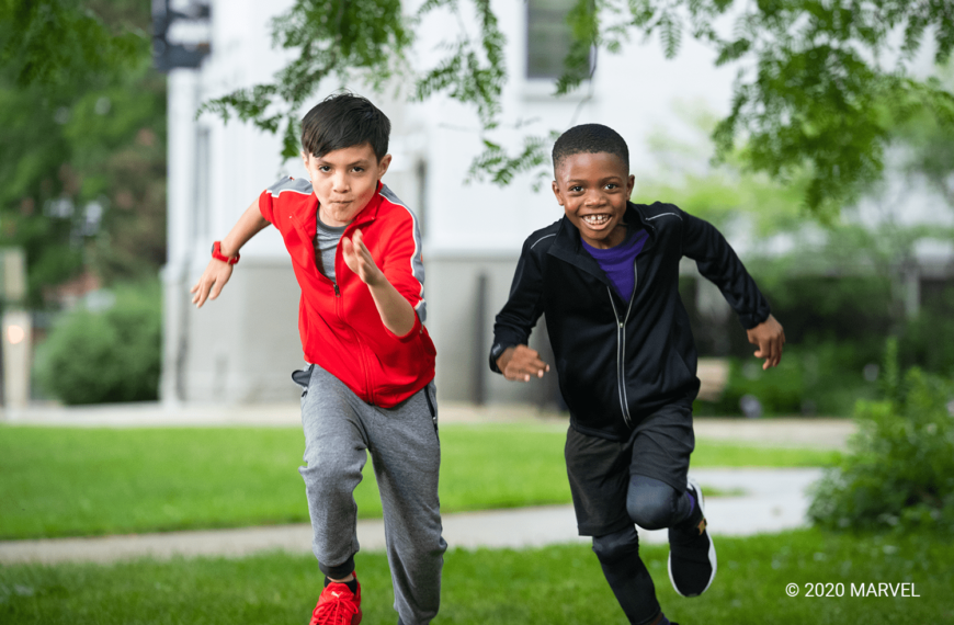 two children running garmin watches