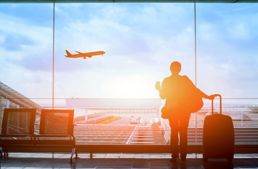 waiting for the flight in airport departure terminal