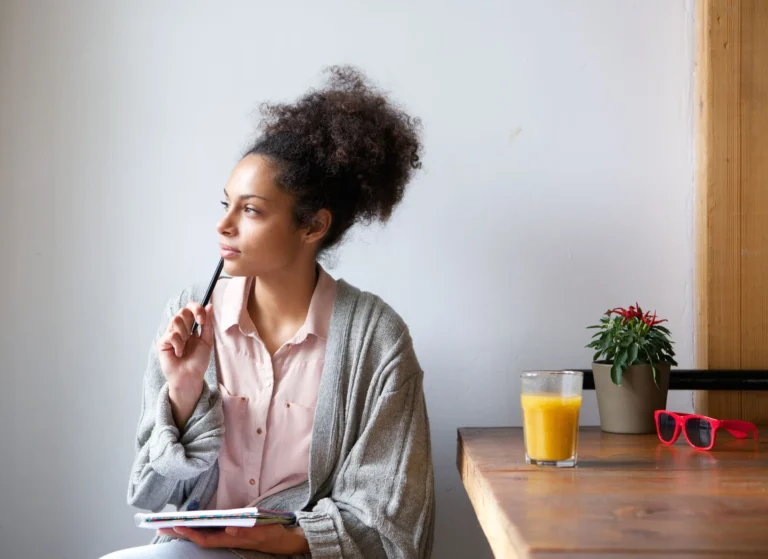 woman contemplating scaled