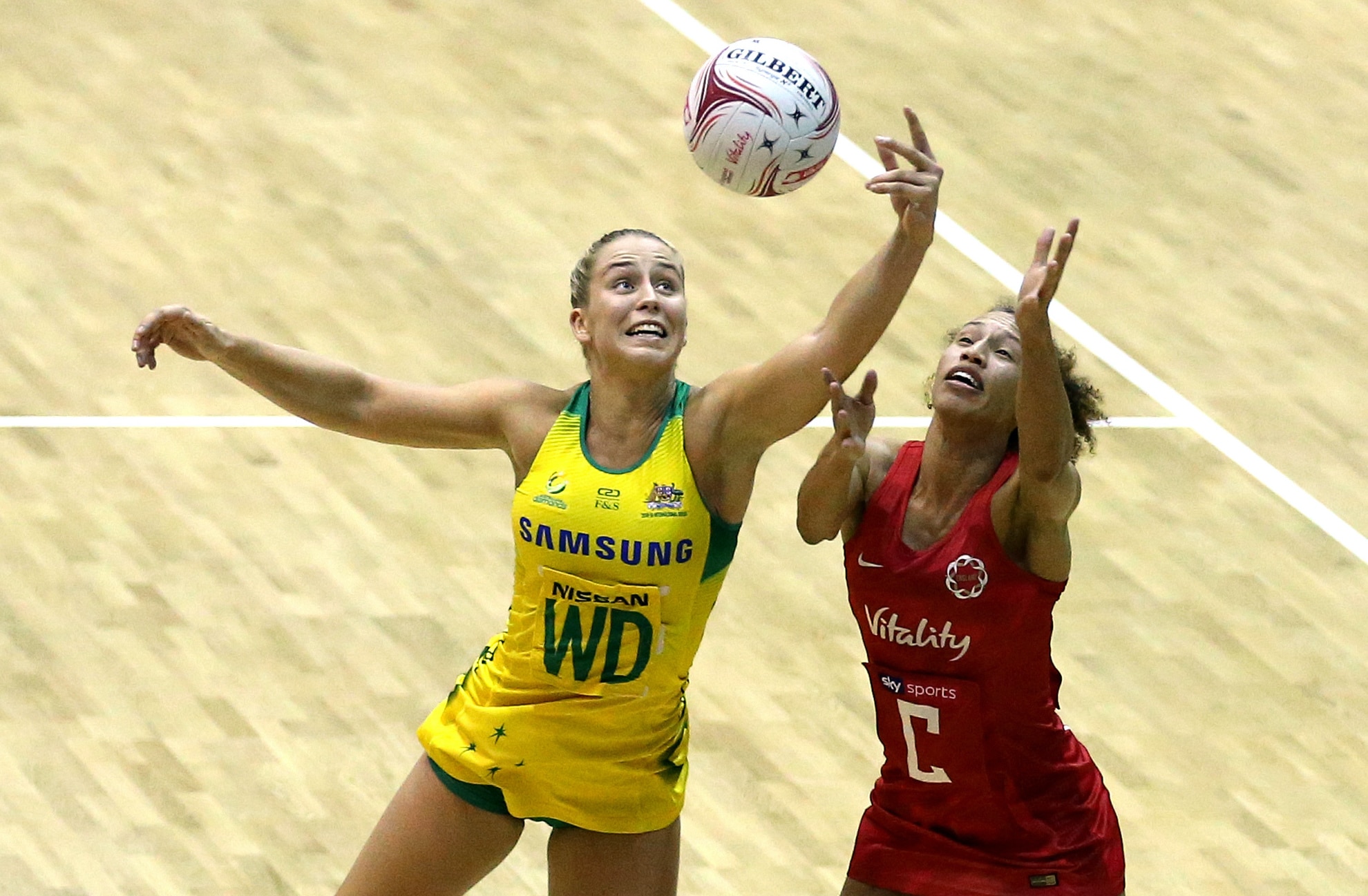 Netball Players Jump For Ball 