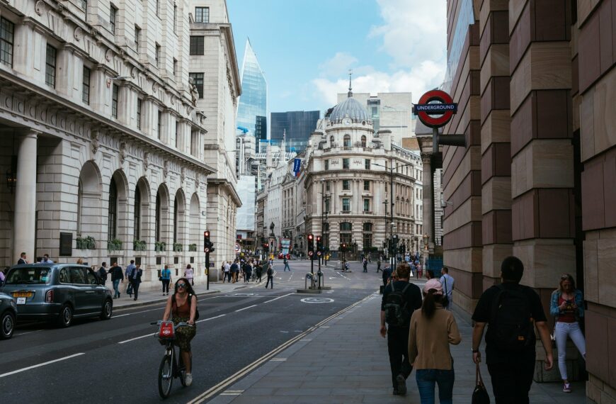 woman cycles through london