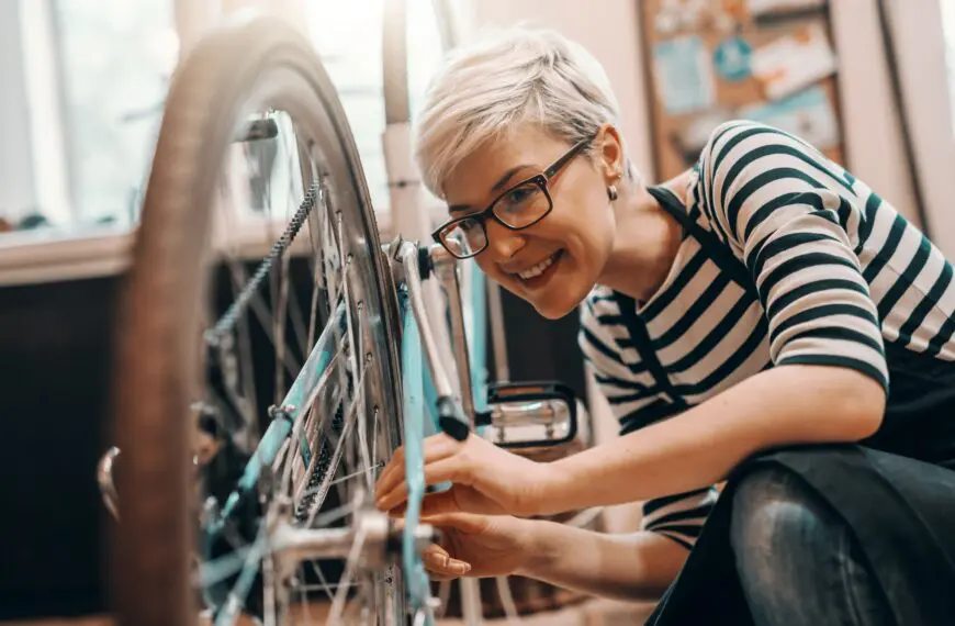 woman looking at bike scaled