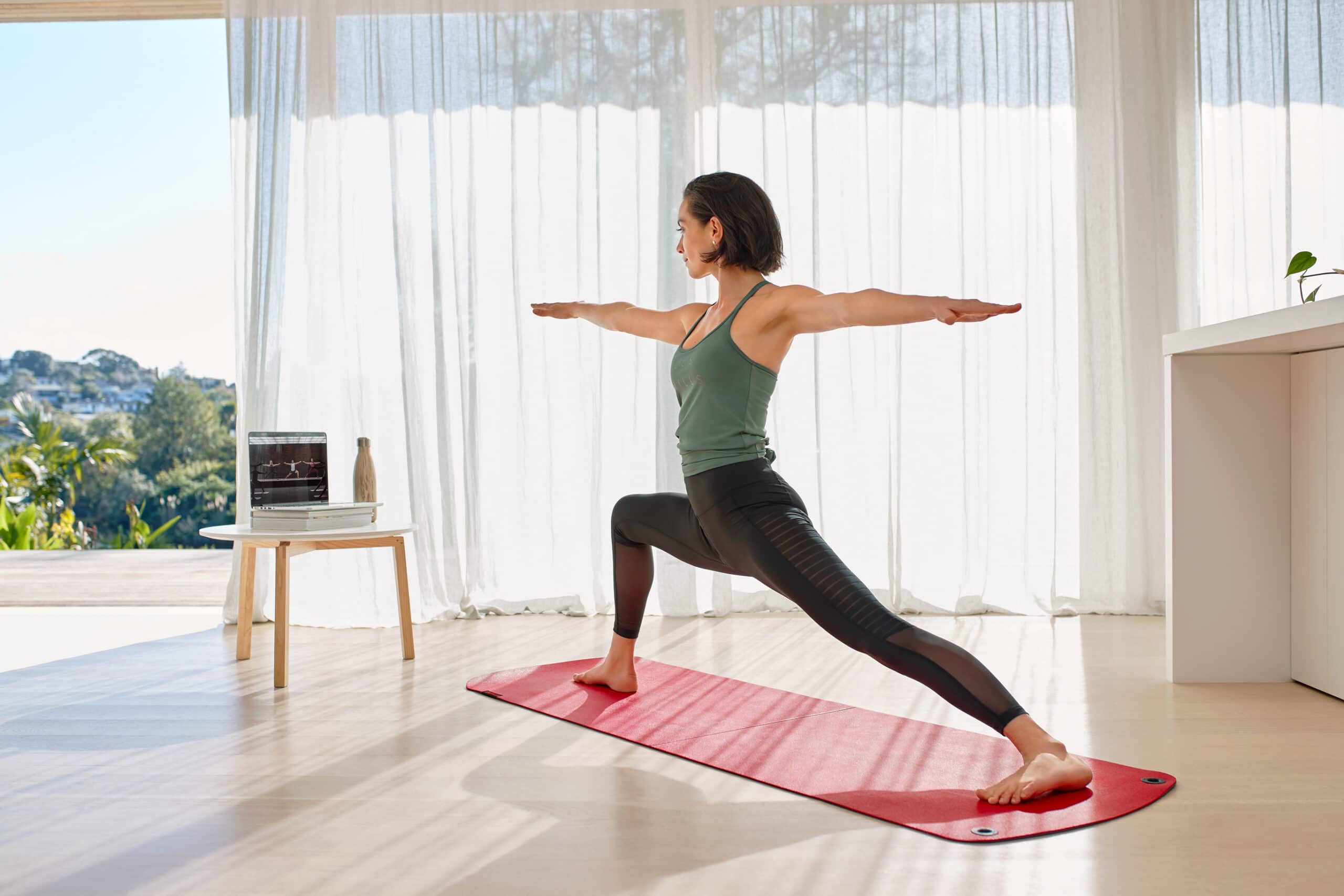Woman practices yoga scaled
