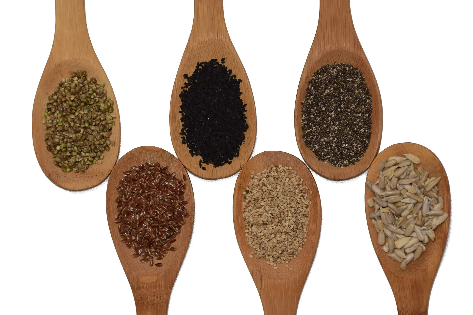 Mixture of seeds on spoons
