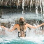 Lady under the waterfall
