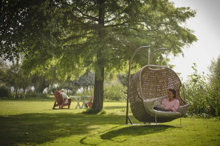 Relaxing in the garden on a Ragdale Hall Spa wellness break scaled
