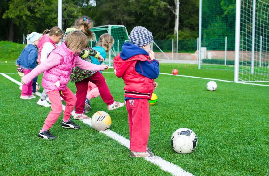 children playing football