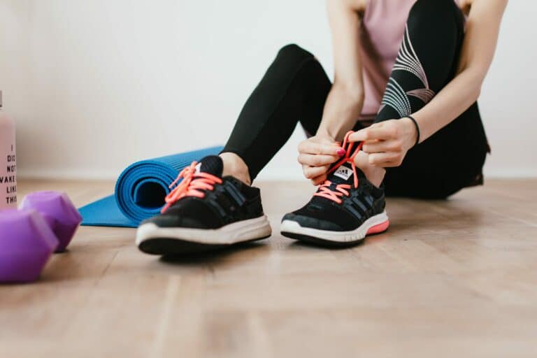 fitness person does laces up scaled