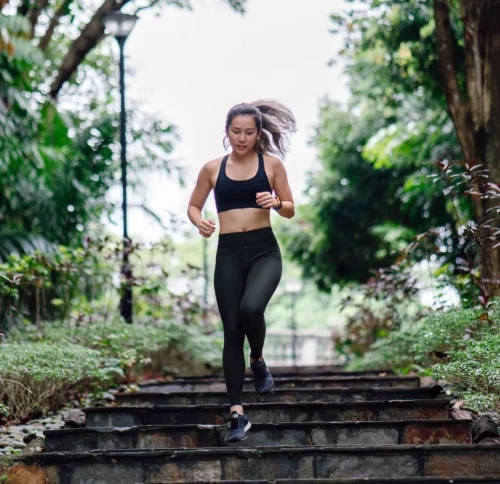 woman exercises outdoors