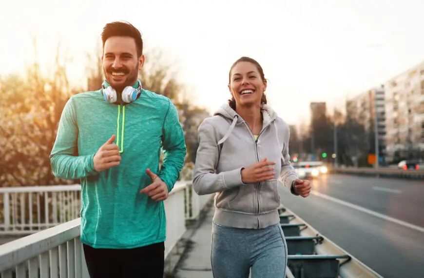 couple running in city scaled