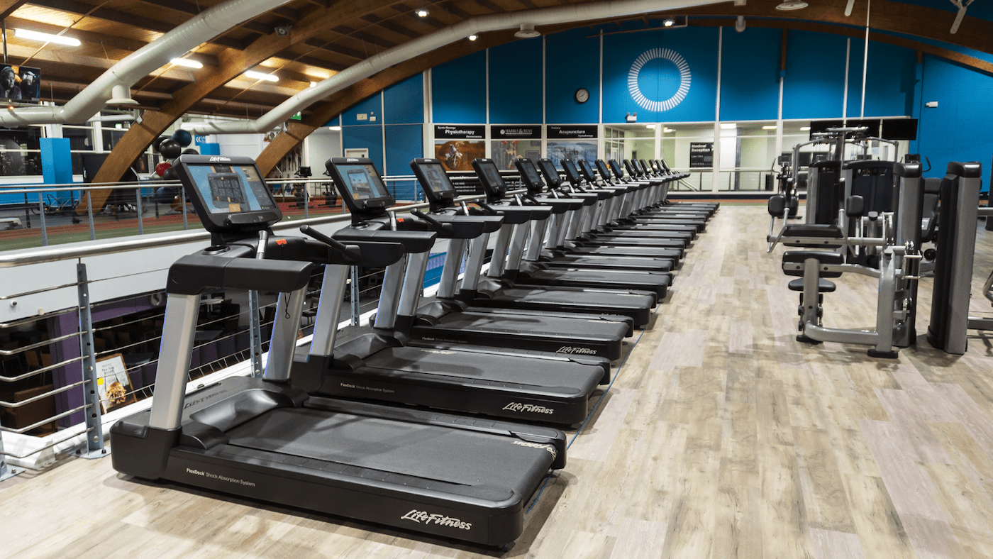 Row of technogym treadmills