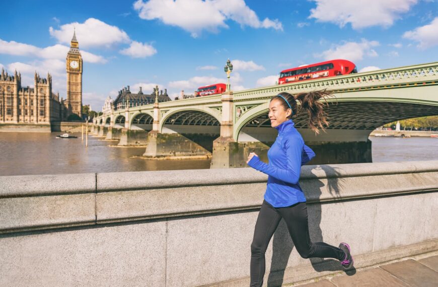 woman runs past westminster