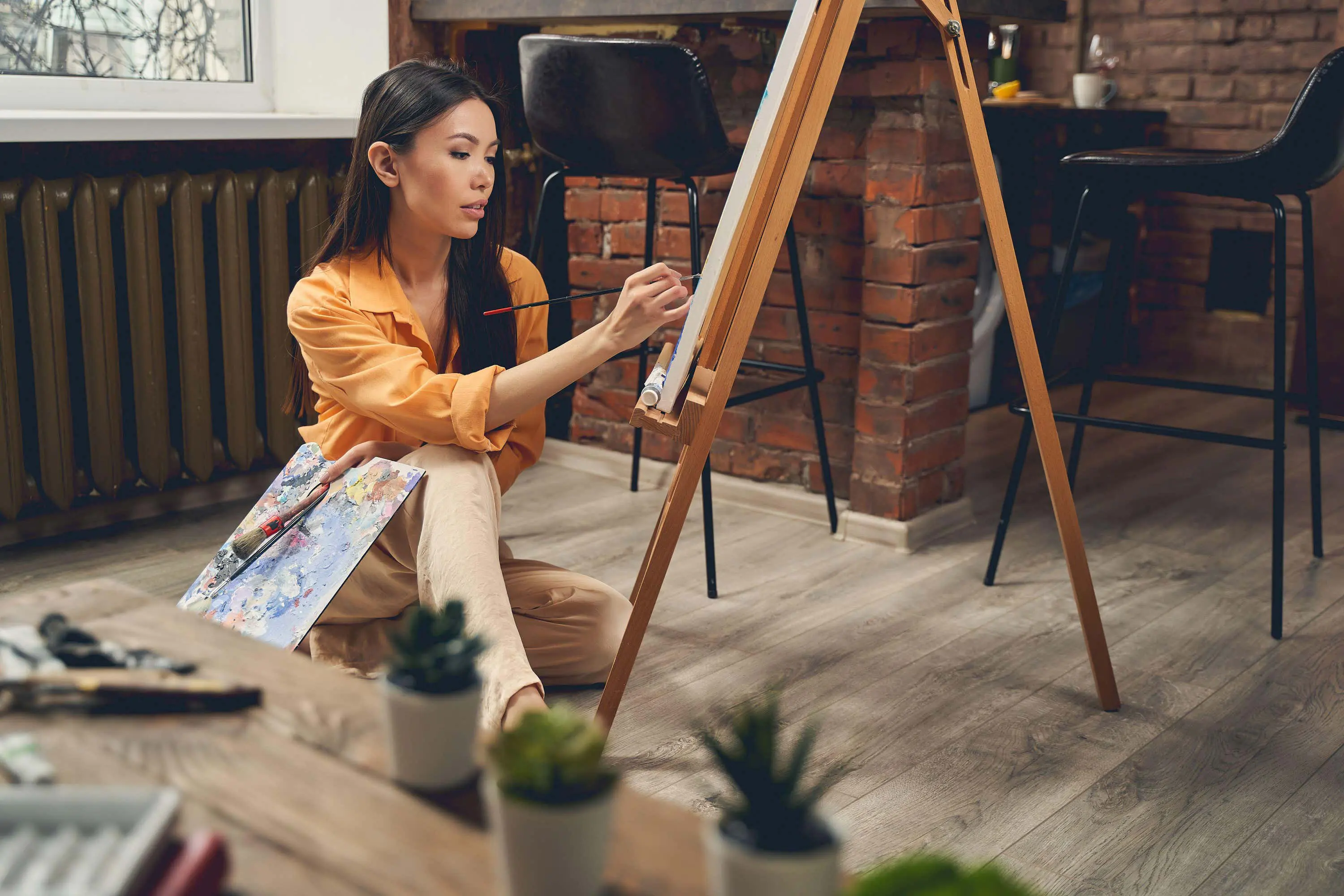 Woman sits at eizel scaled
