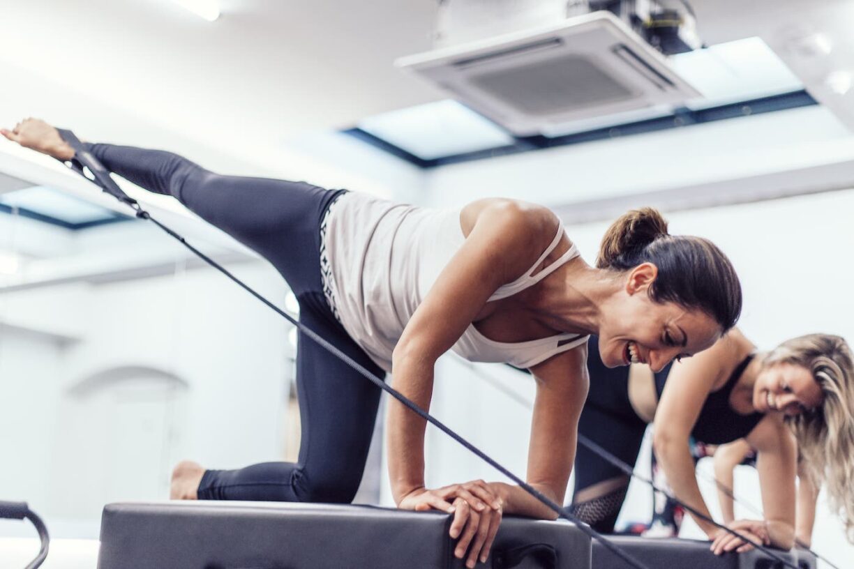 women exercising with resistance bands