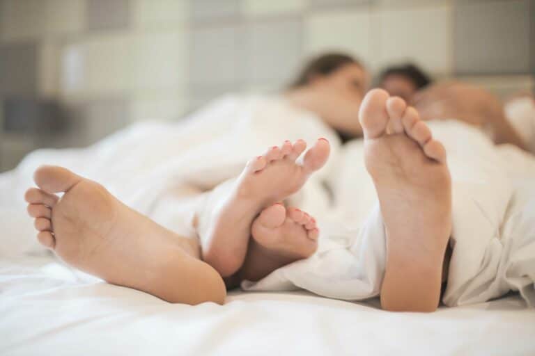 couple lay in bed together