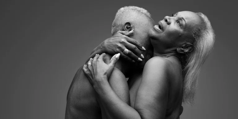 older couple cuddle scaled