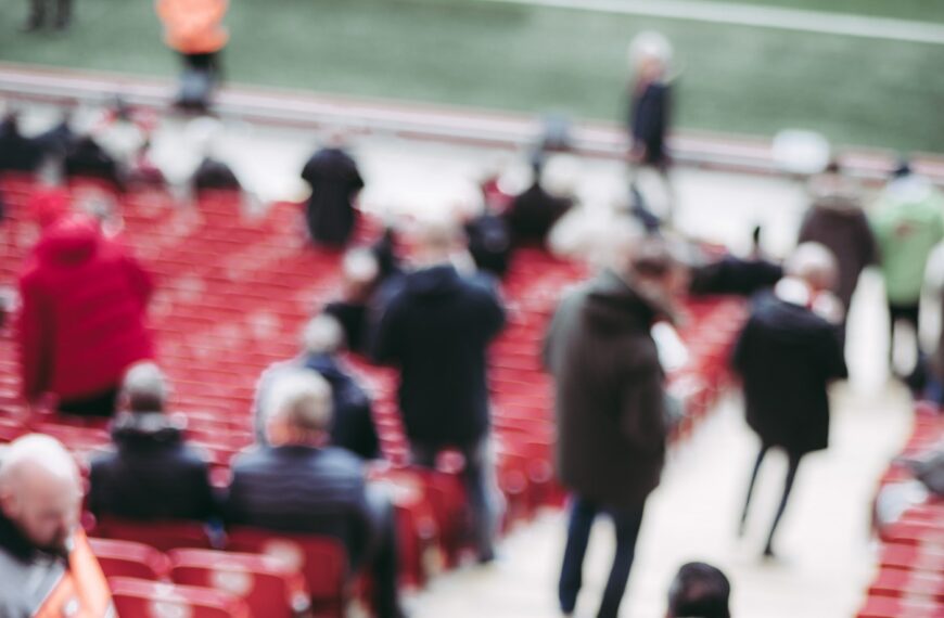 sports fans gather for the match