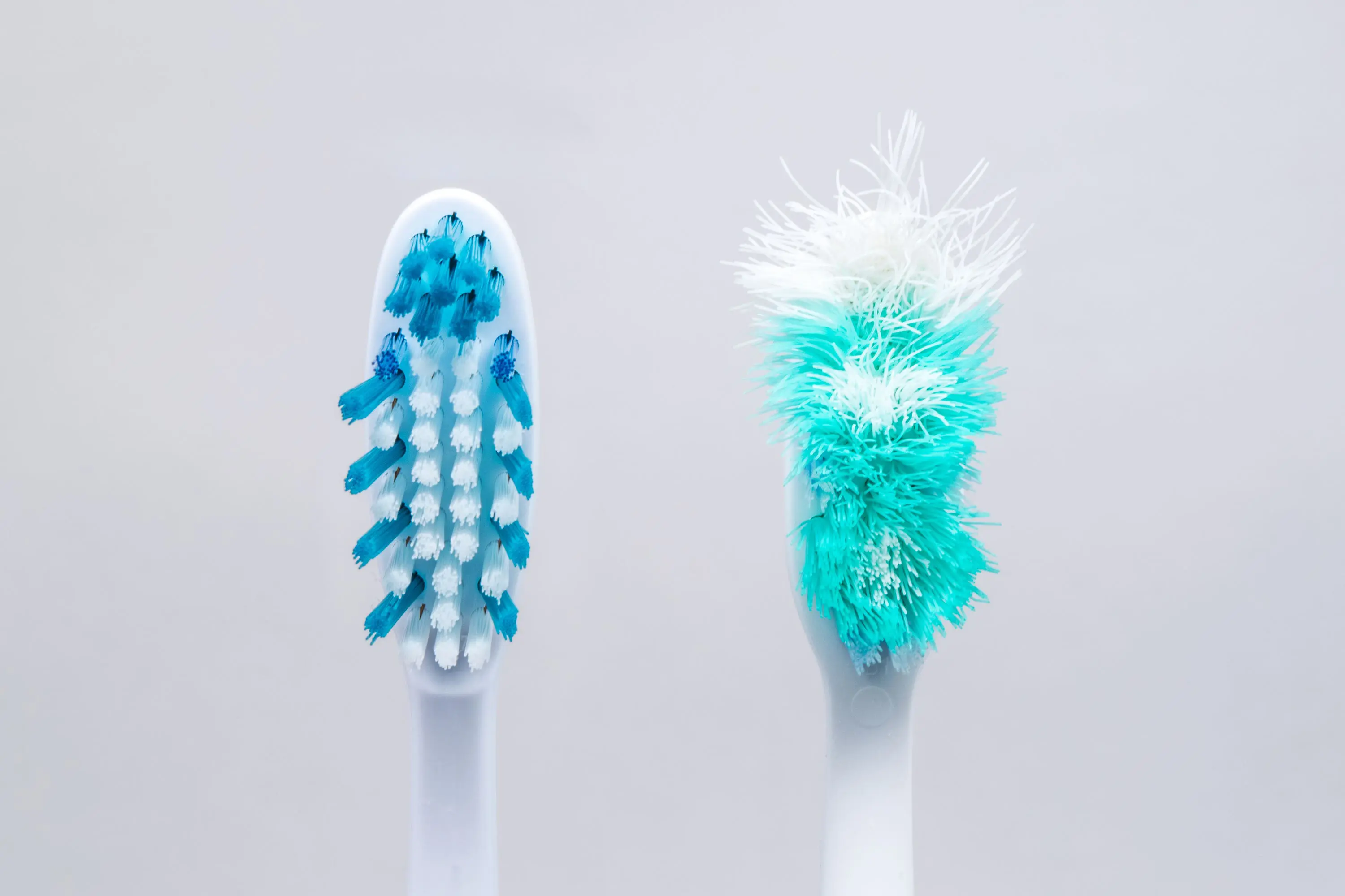 Toothbrushes new and old scaled